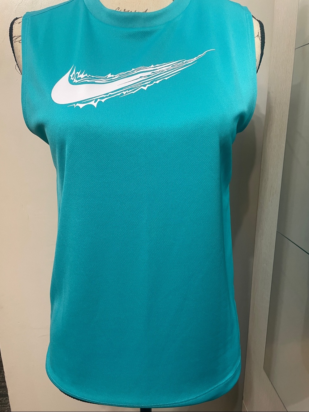 Nike Teal Sleeveless Athletic Tank with White Swoosh
